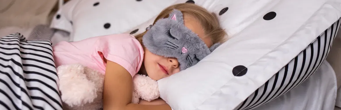 young-girl-sleeping-with-cat-eye-mask